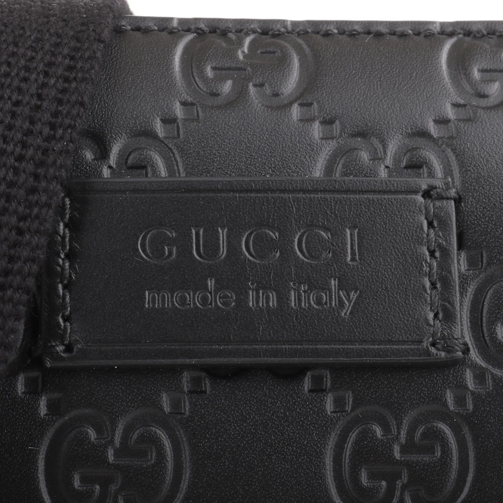經典Guccissima壓紋牛皮拉鍊直式斜背包